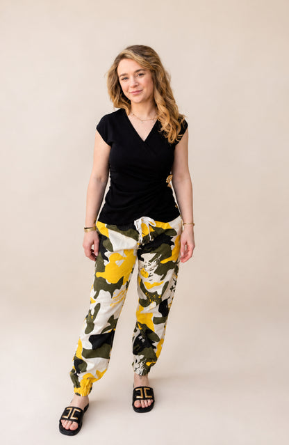 Overslag top met gouden bloem details