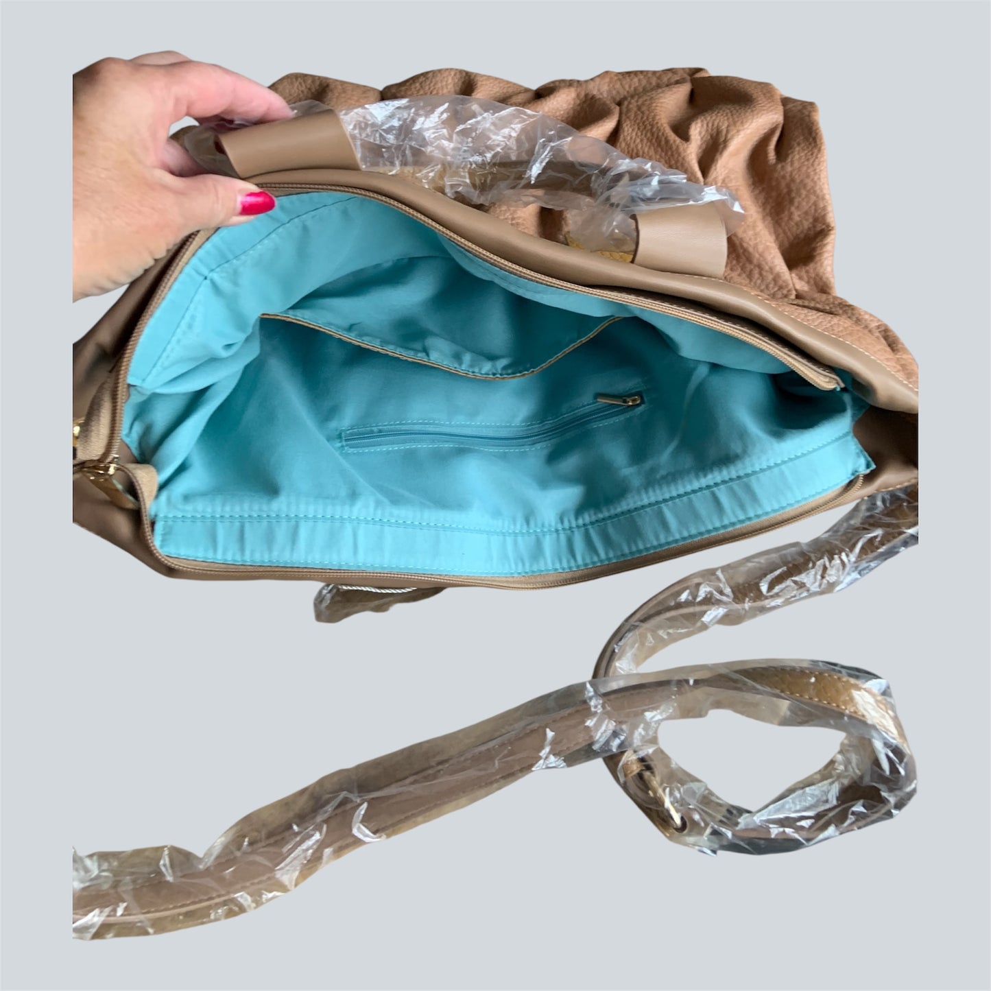 Ruime shopper bruin  met aqua blauw van binnen
